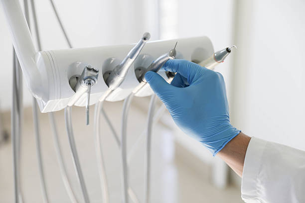 Professional Tooth Extraction technician working in Zionsville, IN